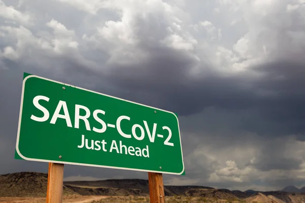 Sars Cov Coronavirus Green Road Sign Ominous Stormy Cloudy Sky —  Fotos de Stock