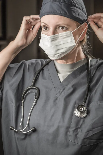 Female Doctor Nurse Stethoscope Putting Protective Face Mask — Stockfoto