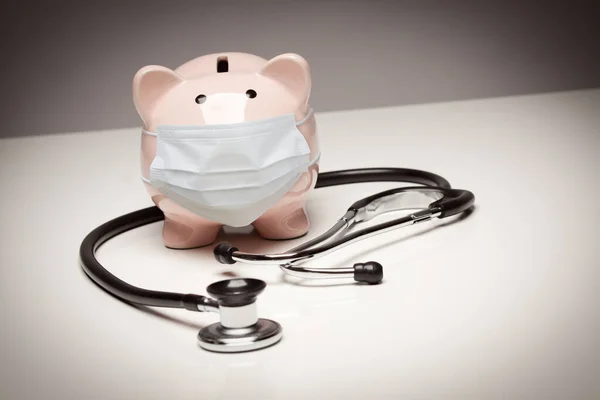 Stethoscope Piggy Bank Wears Protective Medical Face Mask — стокове фото