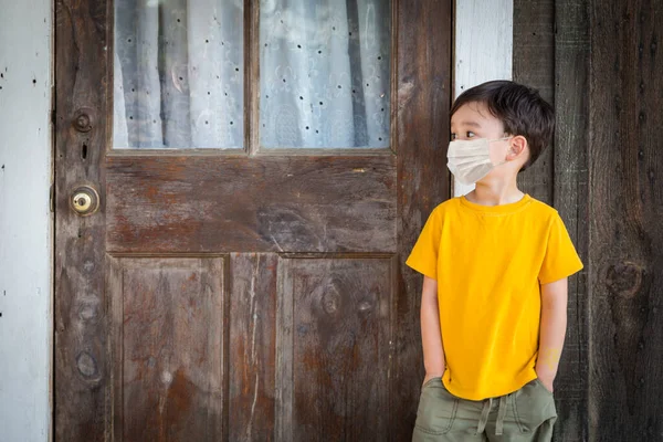 Young Mixed Race Chinese Caucasian Boy Playing Alone Wearing Medical — Stock Photo, Image