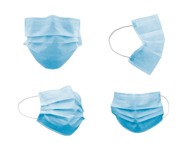 Verzameling Van Blue Medical Face Masks Bij Verschillende Hoeken Geïsoleerd — Stockfoto