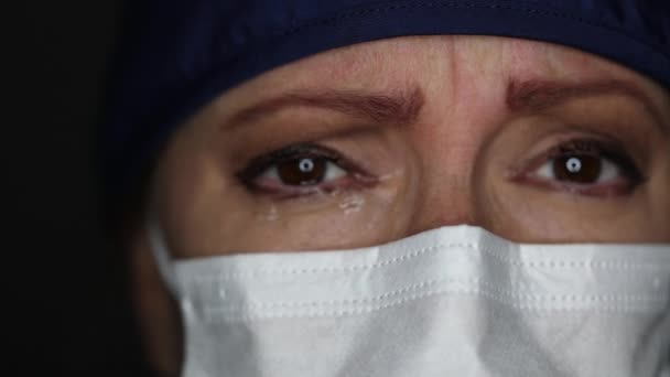 Close Grief Stricken Tearful Doctor Nurse Wearing Medical Face Mask — Stock Video