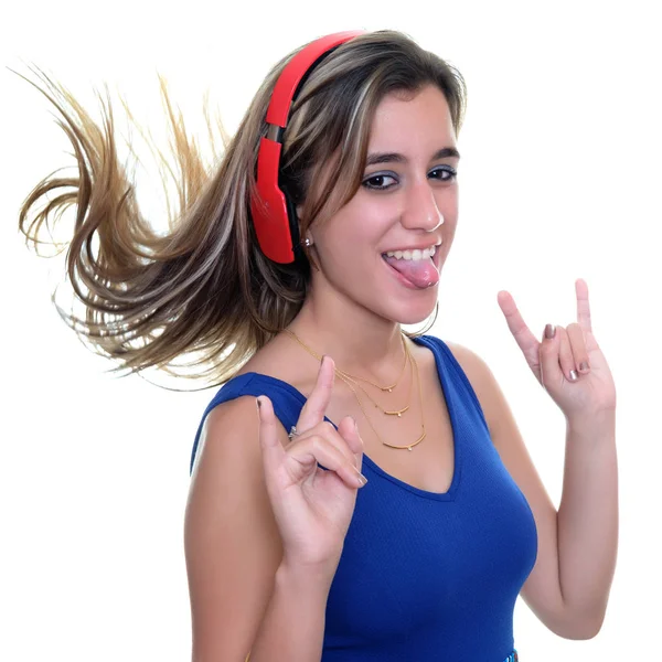 Tonårig flicka Lyssna på musik på trådlösa hörlurar isolerade — Stockfoto