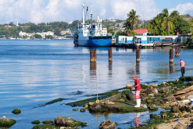 Balıkçılar Regla kıyı şehri yakınındaki Havana Küba'da