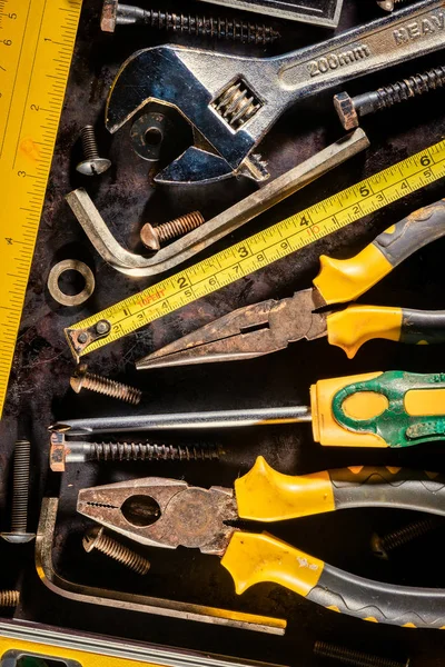 Manual tools on a metallic background — Stock Photo, Image