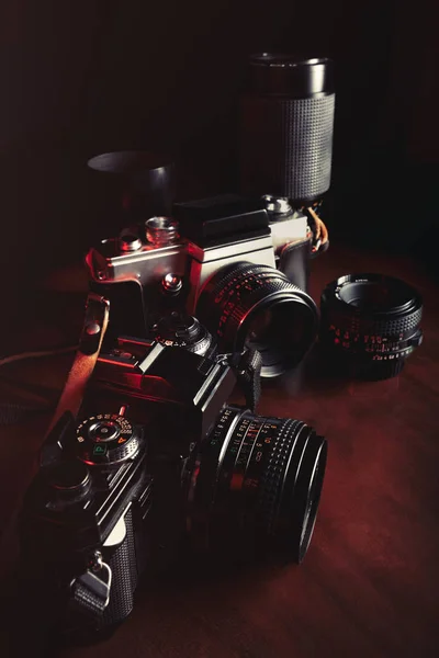 Vintage film cameras and lenses — Stock Photo, Image