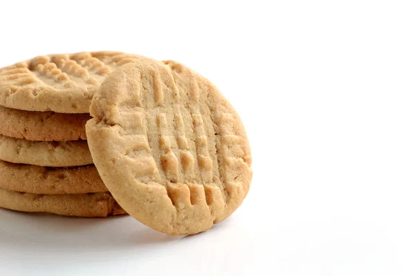 Galletas de mantequilla de maní sobre fondo blanco Fotos de stock libres de derechos