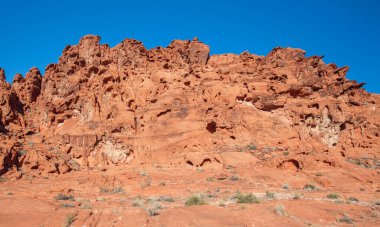 Nevada Çölü 'ndeki Fire State Park Vadisi' nde kaya oluşumları. Fire State Park Vadisi, ABD 'nin Nevada eyaletindeki en eski eyalet parkıdır ve 1968 yılında 