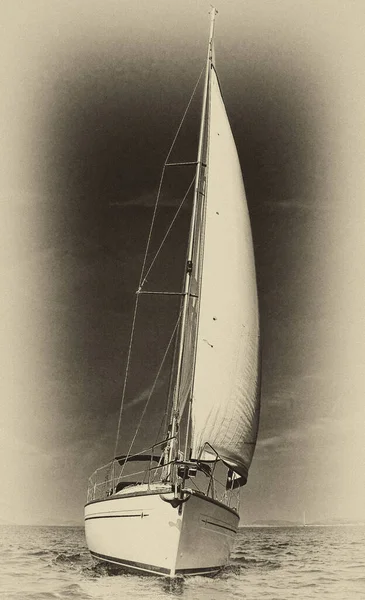 Vintage style image of a sailing yacht