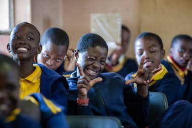 Unidentified Swazi children on July 29, 2008 in the Nazarene Mission School in Piggs Peak, Swaziland. clipart