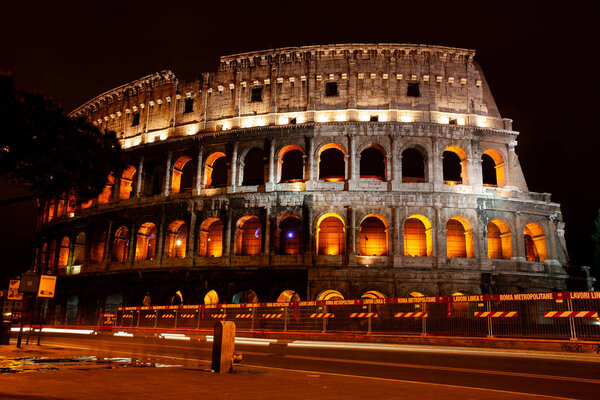 Famous ruins of Colosseum at night time in the capital of Italy Rome.