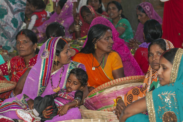 RAXAUL, INDIA - NOV 8: Unidentified Indian women celebrating Chhath on Nov 8, 2013 in Raxaul, Bihar state, India.