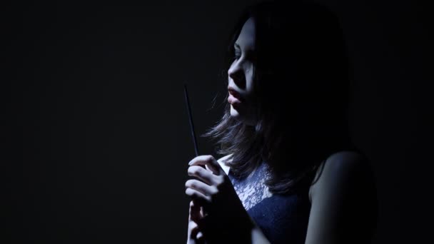 Portrait of a horror Halloween Scream inspired teen girl with a knife — Stock Video