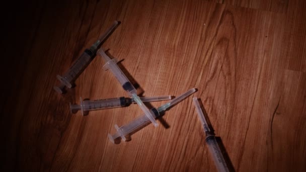 Falling syringes. Syringe drug abuse concept. Slow motion — Stock Video