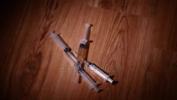 Falling syringes. Syringe drug abuse concept. Slow motion — Stock Video