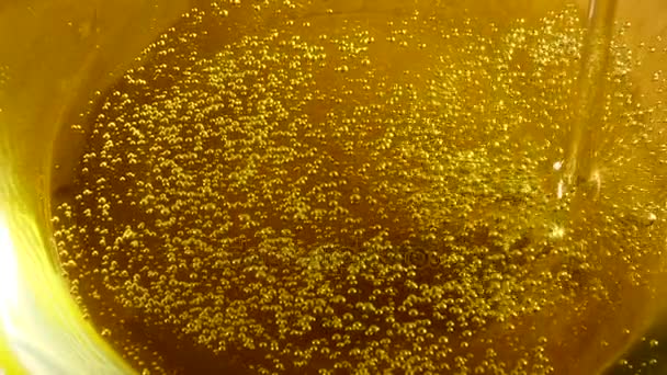 Yellow olive oil food pouring and splashing — Stock Video