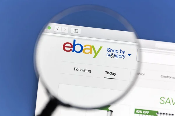 Ebay website under a magnifying glass — Stock Photo, Image