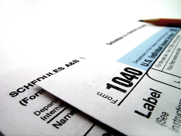 税务文件备案在美国 1040年税和铅笔 — 图库照片