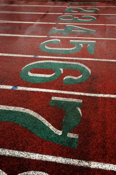 Pista de carreras para correr Concursos Números y carriles — Foto de Stock