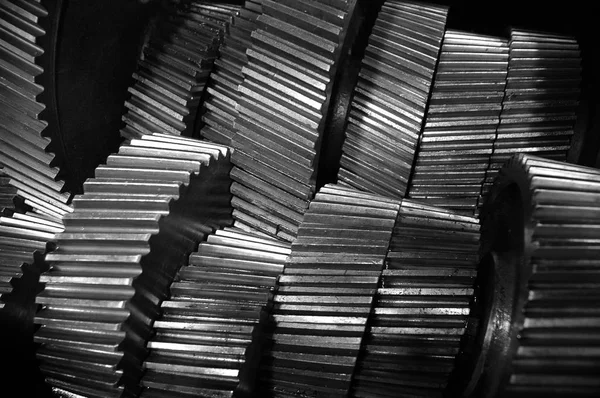 Filas de engranajes metálicos de acero para su uso en maquinaria de máquinas —  Fotos de Stock