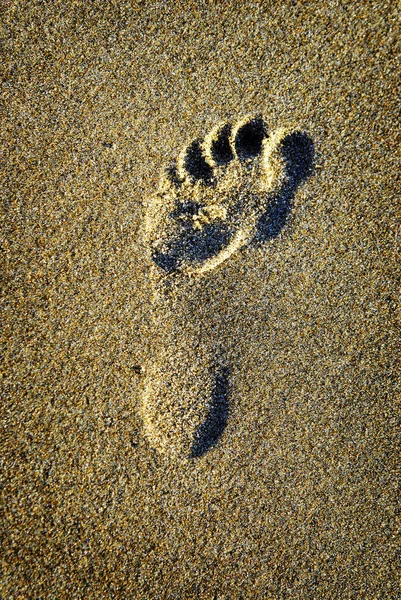 Fußabdruck im Sand am Strand — Stockfoto