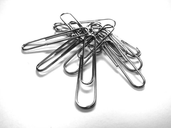 Pile of Silver Metal Paperclips Office Supplies