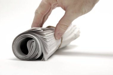 Gazete Haberleri ve el için Isolated kadar beyaz haddelenmiş
