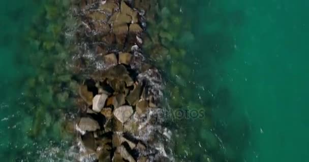 Aerial video of a rock jetty in Miami Beach — Stock Video