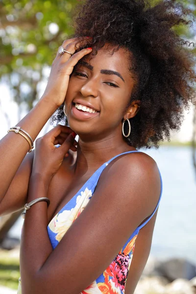 Woman laughing and touching face — Stock Photo, Image