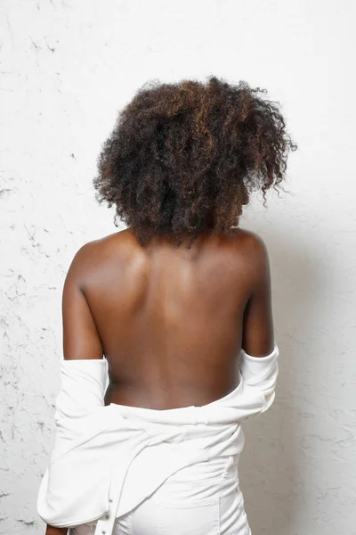 Woman showing her bare back — Stock Photo, Image