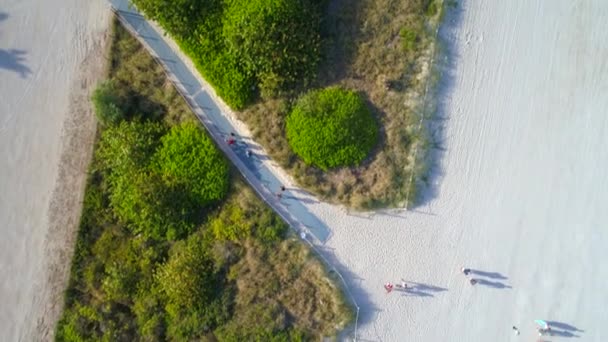Slow motion aerial over beach sand dunes — Stock Video