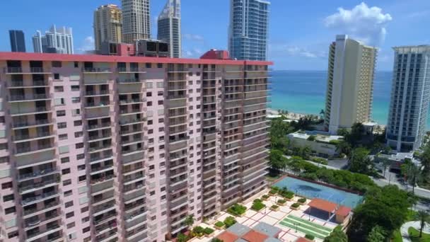 Sunny Isles Beach highrise with hurricane shutters — Stock Video