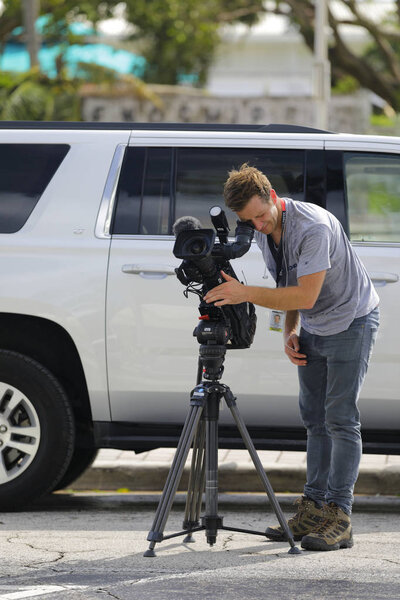 News videographer filming the aftermath of Hurricane Irma in Mia