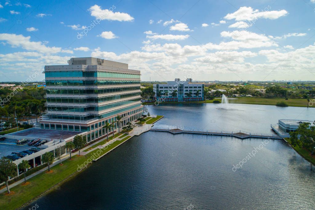 Aerial scenic photo business district with lake and fountain