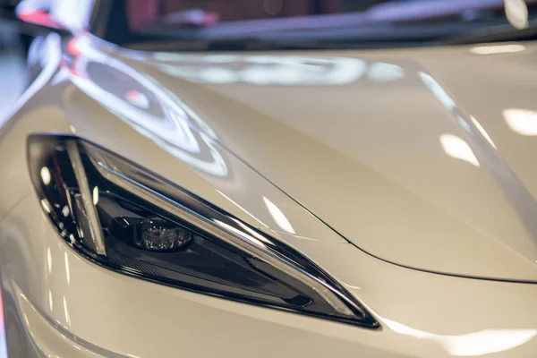 Closeup detail of a sports car headlight — Stock Photo, Image