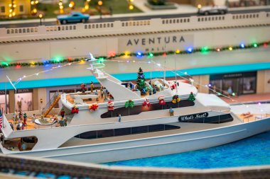 Miniature yacht Whats Next by Aventura Mall shot with macro lens clipart