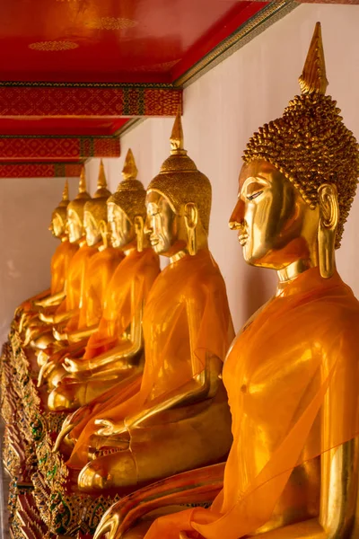 Sitting Buddha statues in Wat Pho — Stock Photo, Image