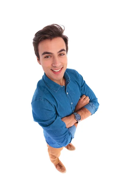 Wide angle picture of a confident casual man smiling — Stock Photo, Image