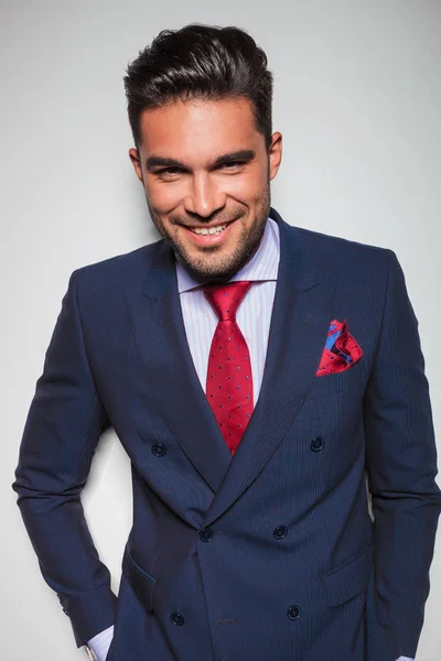 Young elegant man in suit and tie laughing — Stock Photo, Image