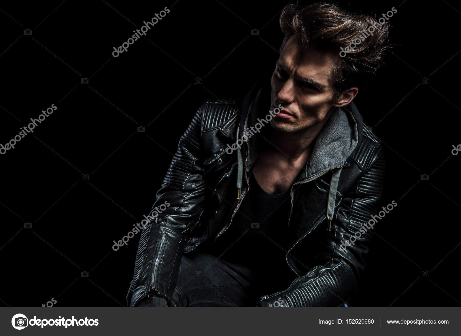 Dramatic portrait of a fashion model in leather jacket Stock Photo by ...