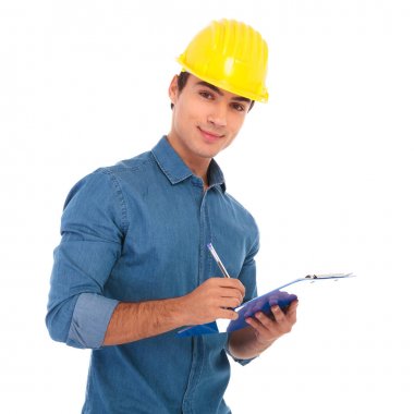 Genç inşaat egineering öğrenci not alma