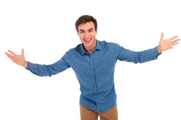 Excited young casual man welcoming — Stock Photo, Image