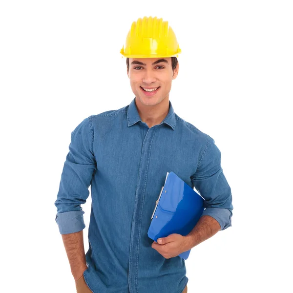 Happy construction engineering student holding clipboard is smil — Stock Photo, Image