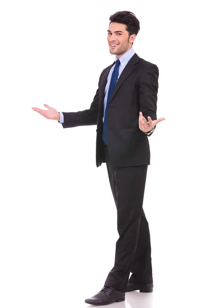 Full body picture of an excited businessman welcoming — Stock Photo, Image
