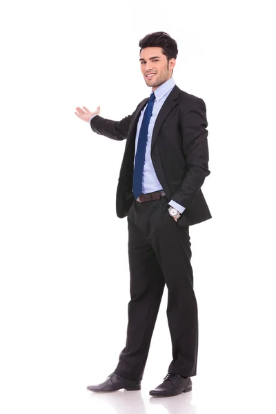 Full body picture of a businessman presenting — Stock Photo, Image