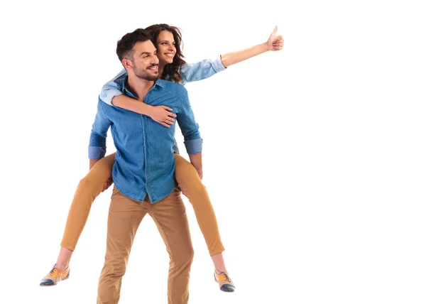 Side view of happy couple making the ok sign — Stock Photo, Image