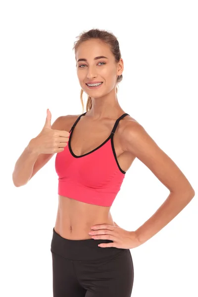 Happy fitness instructor making the ok sign — Stock Photo, Image