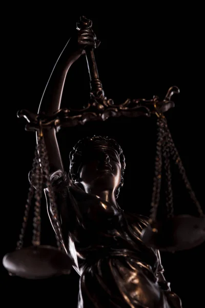 portrait of justice goddess holding her scale