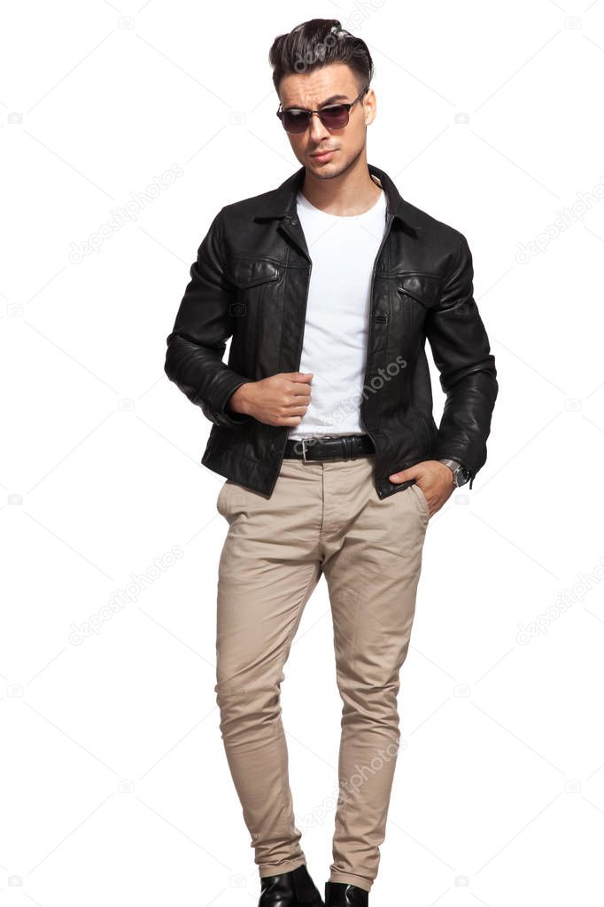 fashion man posing with one hand in pocket 