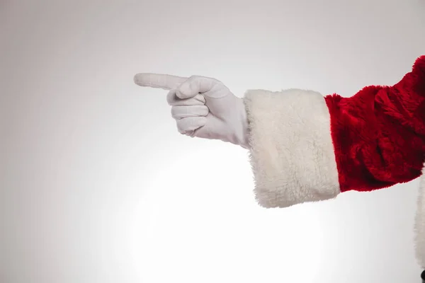 Ręka Świętego Mikołaja, wskazując na stronie — Zdjęcie stockowe